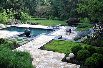 A quiet backyard living space with pool